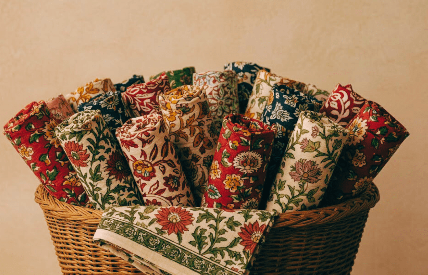 Sanganeri hand block printing on white cotton fabric with delicate floral motifs from Rajasthan