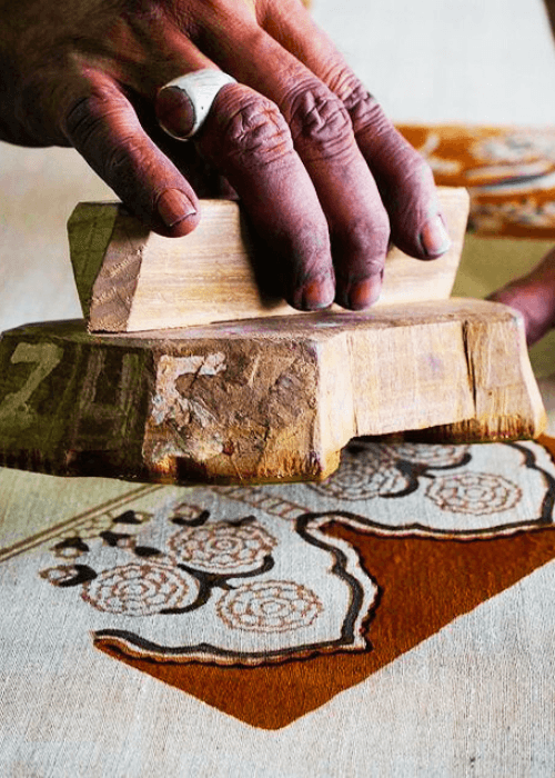 Traditional Sanganeri wooden printing blocks with floral motifs used in textile printing
