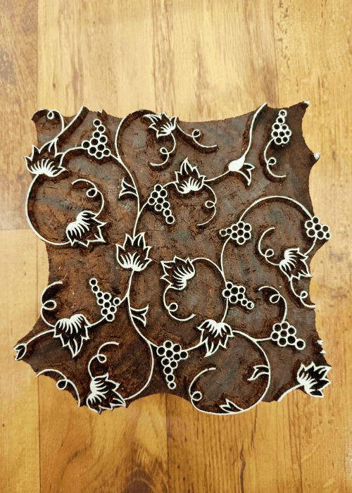 Traditional Sanganeri wooden printing blocks with floral motifs used in textile printing