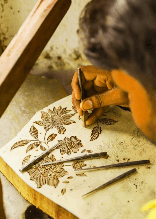 Traditional Sanganeri wooden printing blocks with floral motifs used in textile printing