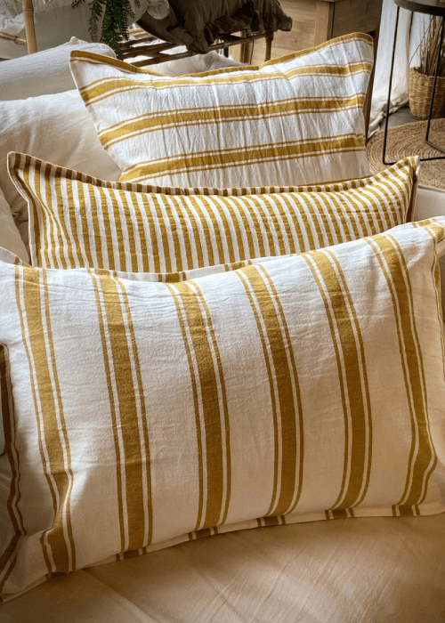 Lightweight, synthetic, and smooth fabrics like polyester, acrylic, and silk in winter interiors, showing cold and less comfortable surfaces