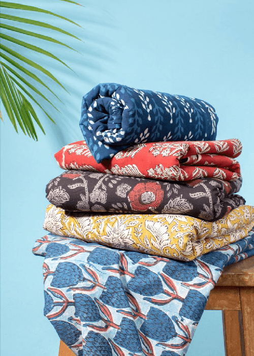 Lightweight, synthetic, and smooth fabrics like polyester, acrylic, and silk in winter interiors, showing cold and less comfortable surfaces