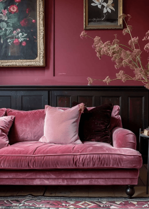Velvet floral home furnishings in a winter living room, featuring textured velvet cushions and warm, soft lighting.