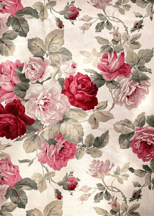 Close-up of rose floral print fabric inspired by garden roses and heritage textile motifs