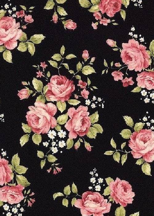 Close-up of rose floral print fabric inspired by garden roses and heritage textile motifs