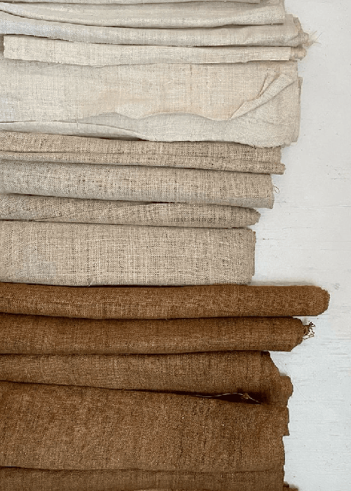 Natural and sustainable home furnishing fabrics made from cotton, linen, and plant-based fibres, showing breathable texture and durable weave.