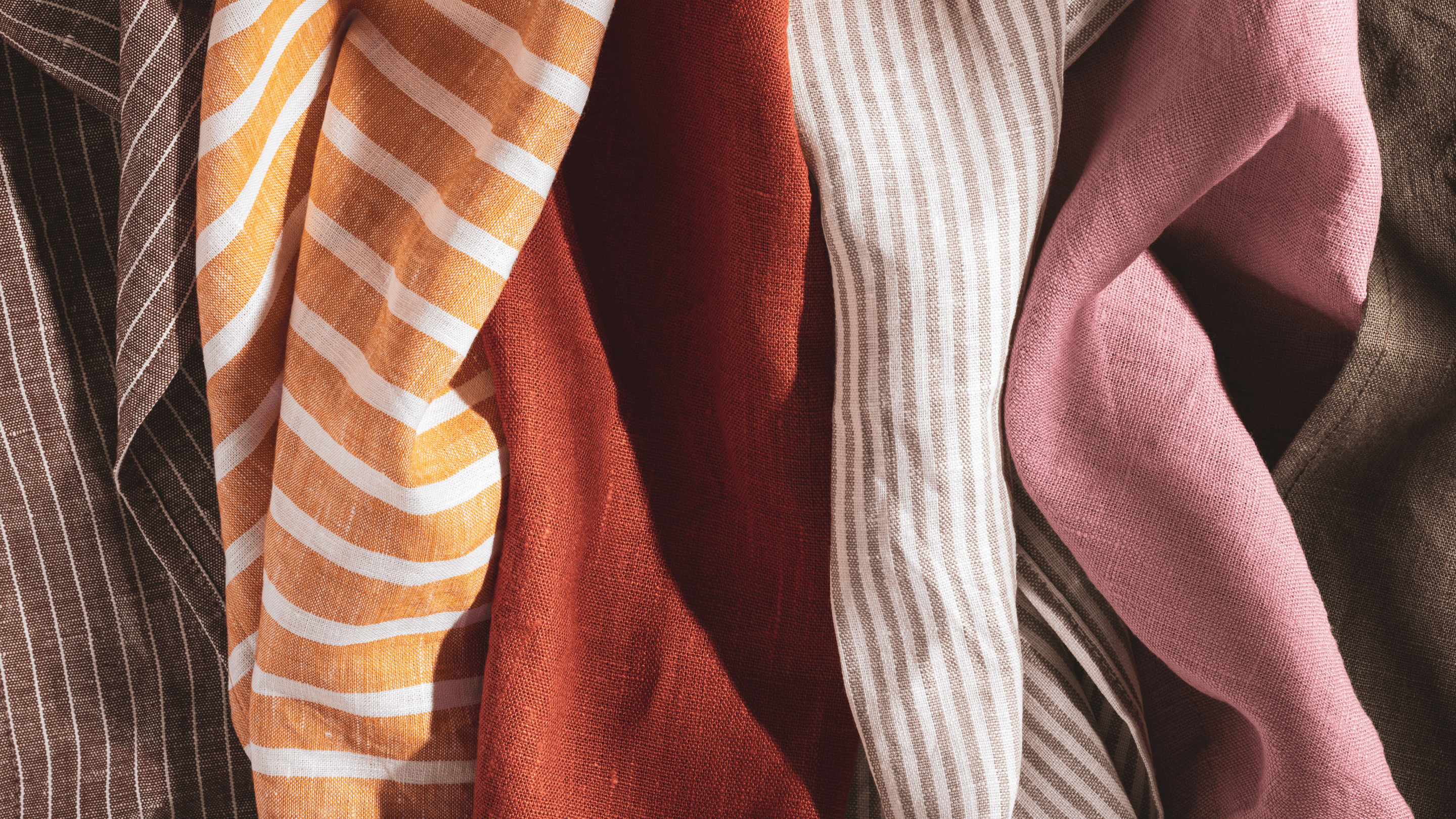 Linen fabric made from flax fibres, highlighting the fabric's lightweight texture and natural elegance.