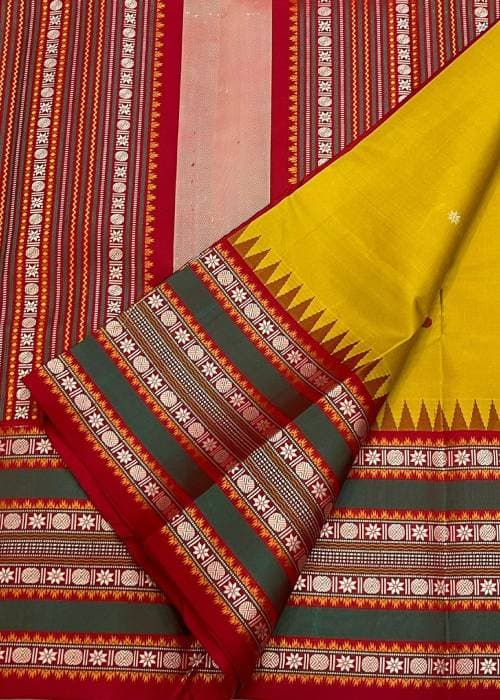 Handloom cotton fabric showcasing the subtle texture and craftsmanship of cloth woven by hand on a traditional loom.