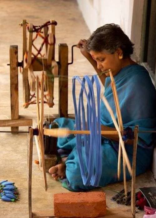 Authentic khadi fabric made from hand-spun yarn and handwoven on a traditional loom, displaying its natural texture and artisanal finish.