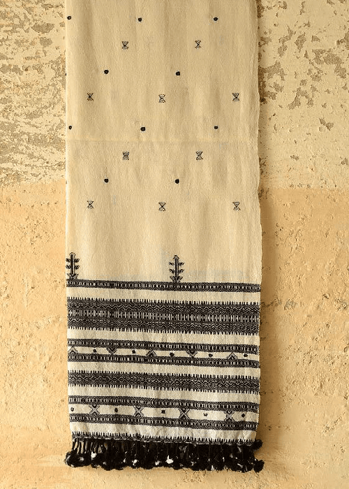 Authentic khadi fabric made from hand-spun yarn and handwoven on a traditional loom, displaying its natural texture and artisanal finish.
