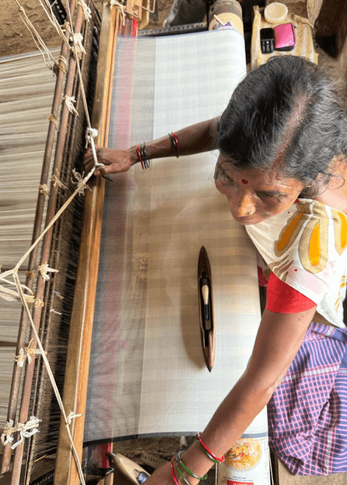 Authentic khadi fabric made from hand-spun yarn and handwoven on a traditional loom, displaying its natural texture and artisanal finish.